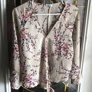 Cream colored floral blouse